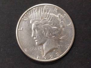 lot 76 image: 1923 S Peace Silver Dollar...