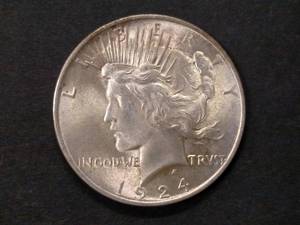 lot 79 image: 1924 Peace Silver Dollar...