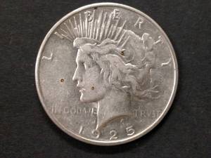 lot 81 image: 1925 Peace Silver Dollar...