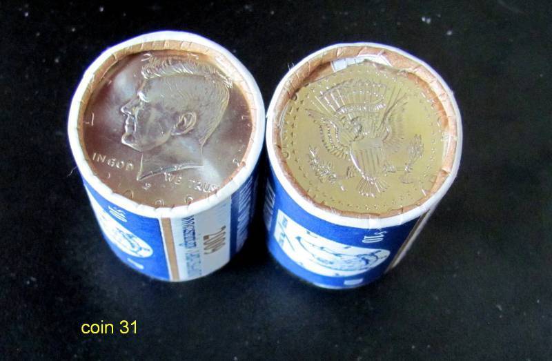 lot 31 image: 2 Rolls - 2009 P & D Kennedy Half Dollars