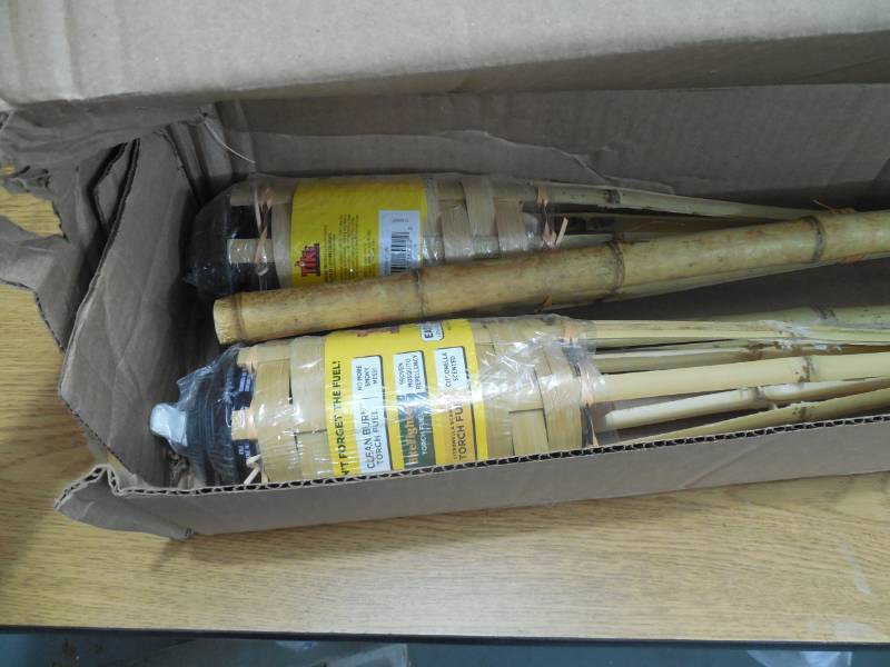 lot 31 image: (3) Mainstays 57-Inch Bamboo Yard Torch, 12 fl oz