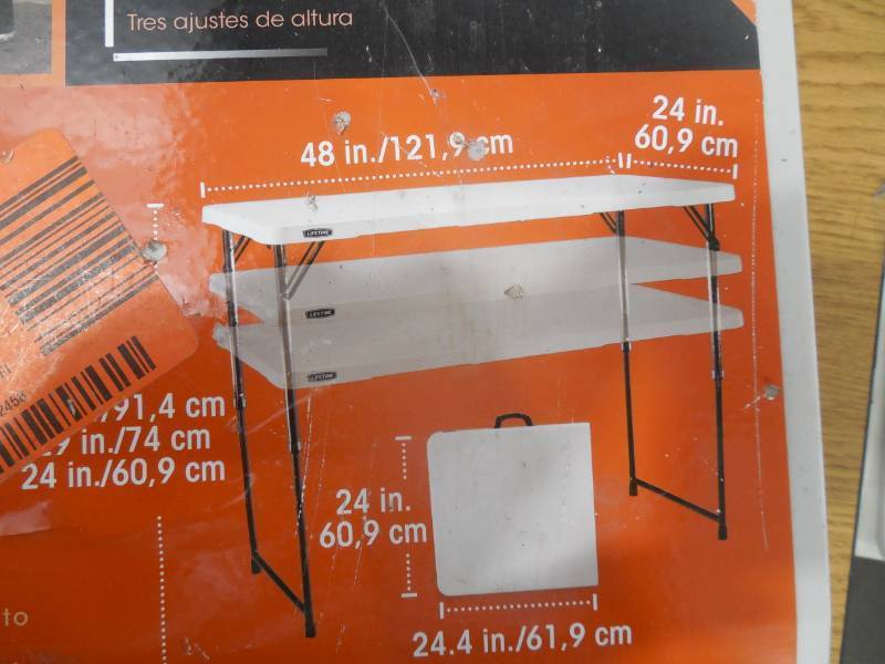 lot 96 image: Lifetime 48 in. Almond Plastic Adjustable Height Folding High Top Table
