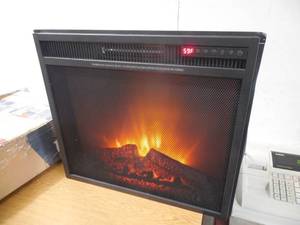 lot 87 image: 23 FIREPLACE INSERT