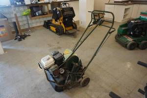 lot 30 image: OMC Lincoln Model 5488 Power Lawn Dethatcher