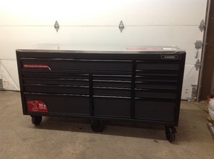 Husky Heavy-Duty 72 in. W 15-Drawer, Deep Tool Chest Mobile Workbench in Matte Black with Stainless Steel Top and Dual Locks not used whit small damage some door dont  open review the photos
