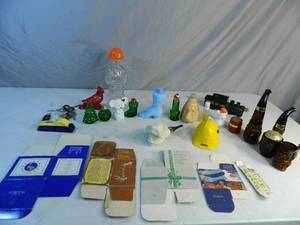 lot 22 image: Vintage Avon Perfume Bottles, Cigarette Cutter, and More