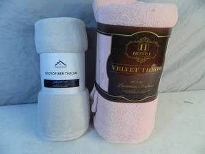 lot 35 image: 2 New Throws