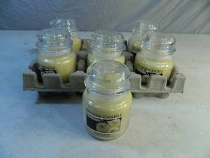 lot 37 image: Case of 6 New Creamy Vanilla Village Candles