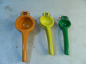 lot 84 image: 3 New Metal Citrus Presses