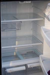 lot 9 image: General Electric stainless steel fridge