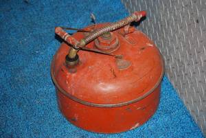 lot 72 image: antique fuel container