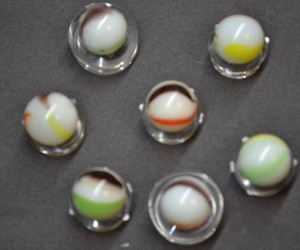 lot 108 image: akro 4 color twist marble lot