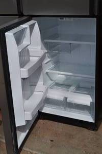 lot 1 image: GE stainless steel refridgeratorfreezer