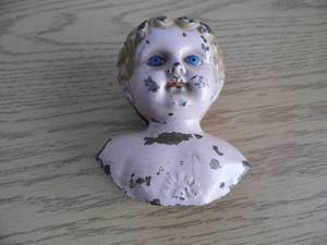 Antique Metal Doll Head