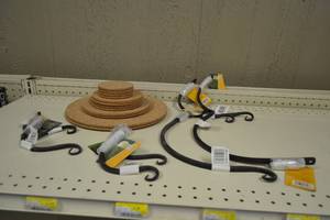 lot 77 image: Lot of 8 Wrought Iron Plant Hooks  Cork Mats