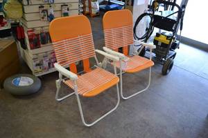 lot 97 image: (2) New Orange Lawn Chairs