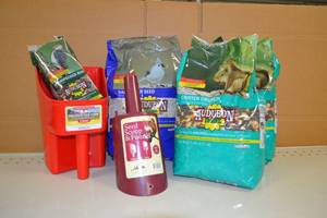 lot 123 image: (2) Bags Audobon Critter Food, Woodpecker Bar and Scoops