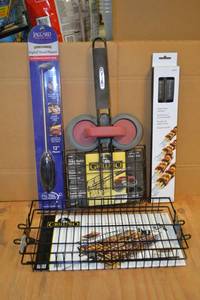 lot 142 image: GrillPro Rotisserie Basket with Slider Press and Basket  Skewers and Flipper