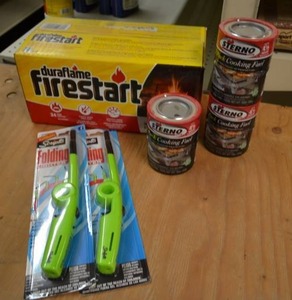 lot 148 image: (3) Packs of Sterno Cooking Fuel Cans and (24) duraFlame fire Starters  Lighters