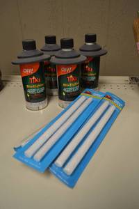 lot 133 image: (4) OFF Citronella Tiki Torch Fuel Cans  (5) Packs of Replacement Wicks