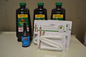 lot 132 image: (3) Bottles BiteFighter Tiki Torch Fuel  (4) Replacement Wicks and Fill Spout