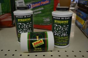 lot 222 image: 2 Bottles Morrisons Tree Sealer and Package of Wrap