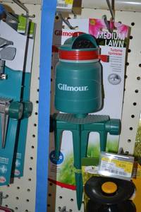 lot 279 image: Gilmour Sprinklers and Hose Guides