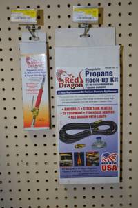 lot 303 image: Red Dragon Propane Mini Torch w Squeeze Handle and Propane Hook Up Kit