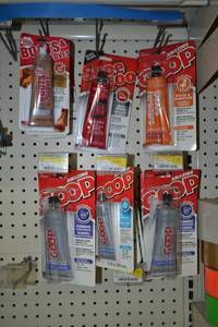 lot 377 image: (16) Packages Goop Adhesive and More