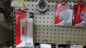 lot 1541 image: Lot of Glass Case Locks, Door Reinforcers, Hole Filler Plates and More