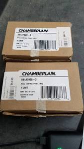 lot 1543 image: (2) Chamberlain Garage Door Wall Control Panel