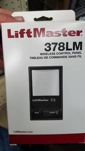 lot 1556 image: (2) LiftMaster Wireless Garage Door Control Panels