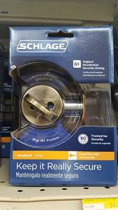 lot 1588 image: (2) Schlage Keyed Deadbolts - Antique Brass