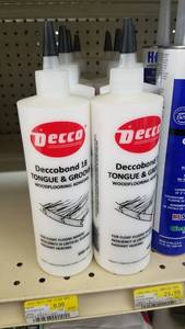 lot 1640 image: (9) Decco Tongue and Groove Adhesive and (8) Cove Base Adhesive