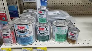 lot 2177 image: Large Lot of OATEY PVC Cement, Solvent and Range Charcoal Type Filters