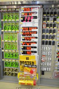 lot 2343 image: Inventory of Vinyl Signs and Take One Tubes