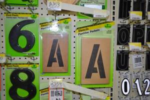 lot 2353 image: (4) Packs 6 and 5  Number and Letter Stencils