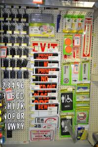 lot 2359 image: Inventory of Plastic Signs and Take One Boxes  Rack