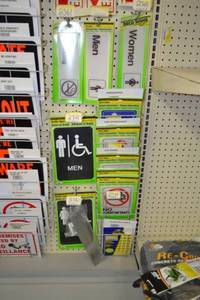 lot 2361 image: Lot of MenWomen Bathroom Signs, No Smoking and More w rack