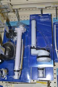 lot 2217 image: Huge Lot of Toilet Flush Valves, Flanges, Rubber Seal Kits and More