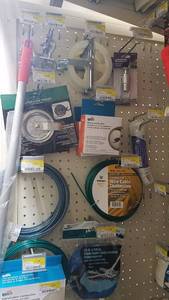 lot 1031 image: Inventory of Clotheline Pulleys, Line and More