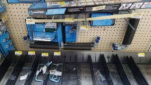 lot 1056 image: Lot of Crawford Storage Hooks, Storage System and More