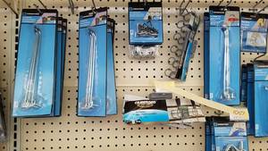 lot 1057 image: Large Lot of Assorted Pegboard Hooks and More