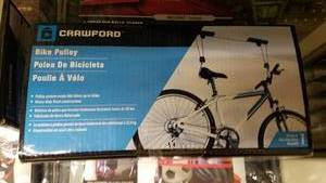 lot 1060 image: Rawlings Horizontal Sprts Storage System and Crawford Hanging Bike Pulley