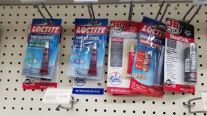 lot 1119 image: JB Weld and Loctite Threadlocker , Steelstick and More