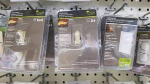 lot 1251 image: (6) Cooper Toggle Dimmers and LED Step Lights