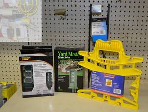 lot 1277 image: (3) Power Zone Outdoor Power Spikes and Yard Master Power Spike  2 Extension Cord Organizers
