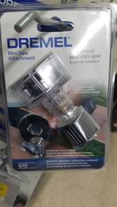 lot 2106 image: Dremel 20 Piece Cleaning and Polishing Kit  Dremel Mini-Saw Attachment