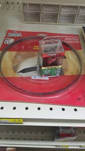 lot 2144 image: Lot of Band Saw Blades, RotoZip Bit, Veneer Facing and More