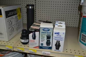 lot 2299 image: Large Lot of Various Sump Pump Check Valves and More